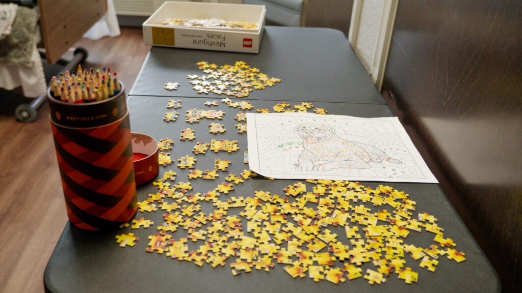 A puzzle activity at Hiram shaddox a skilled nursing facility